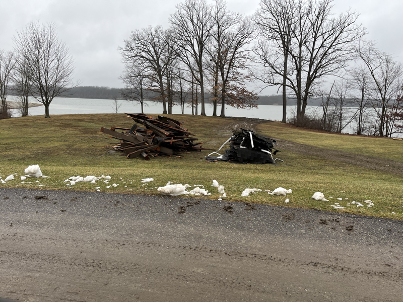 Piles of lumber that used to be the picnic shelter only a week later. Photo from 29-Jan-2023.
